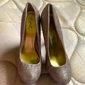 Shiny gold heels